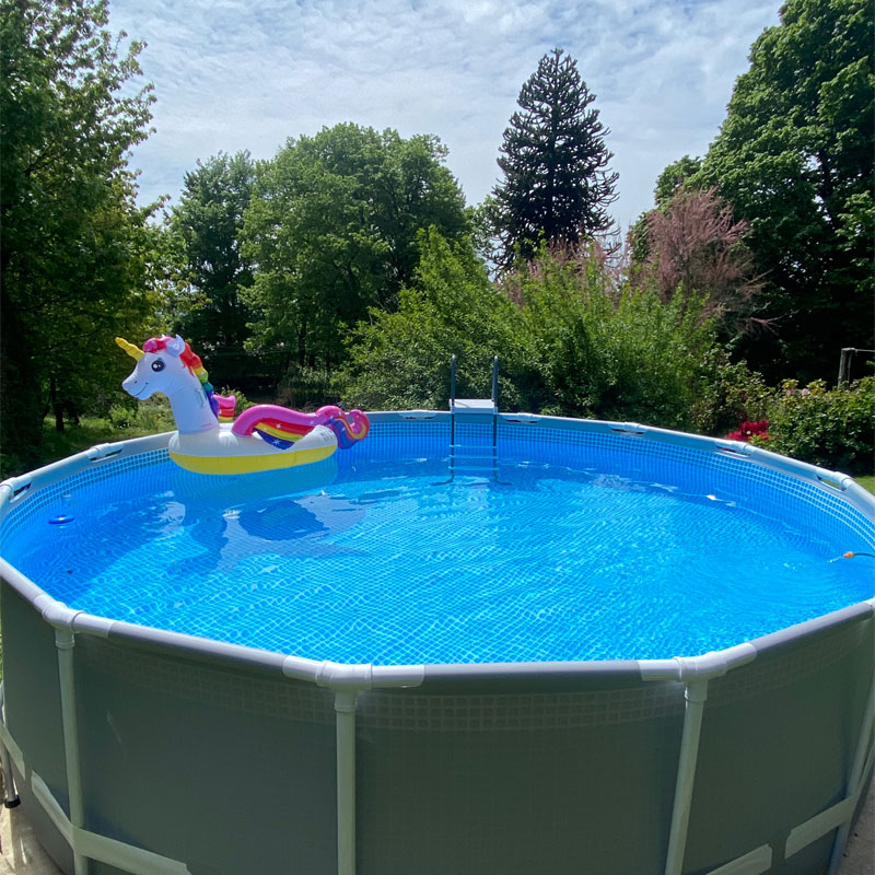 Outdoor swimming pool with inflatable unicorn