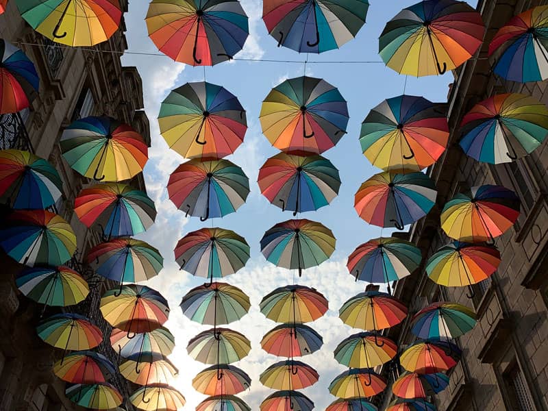 Row of umbrellas above street level